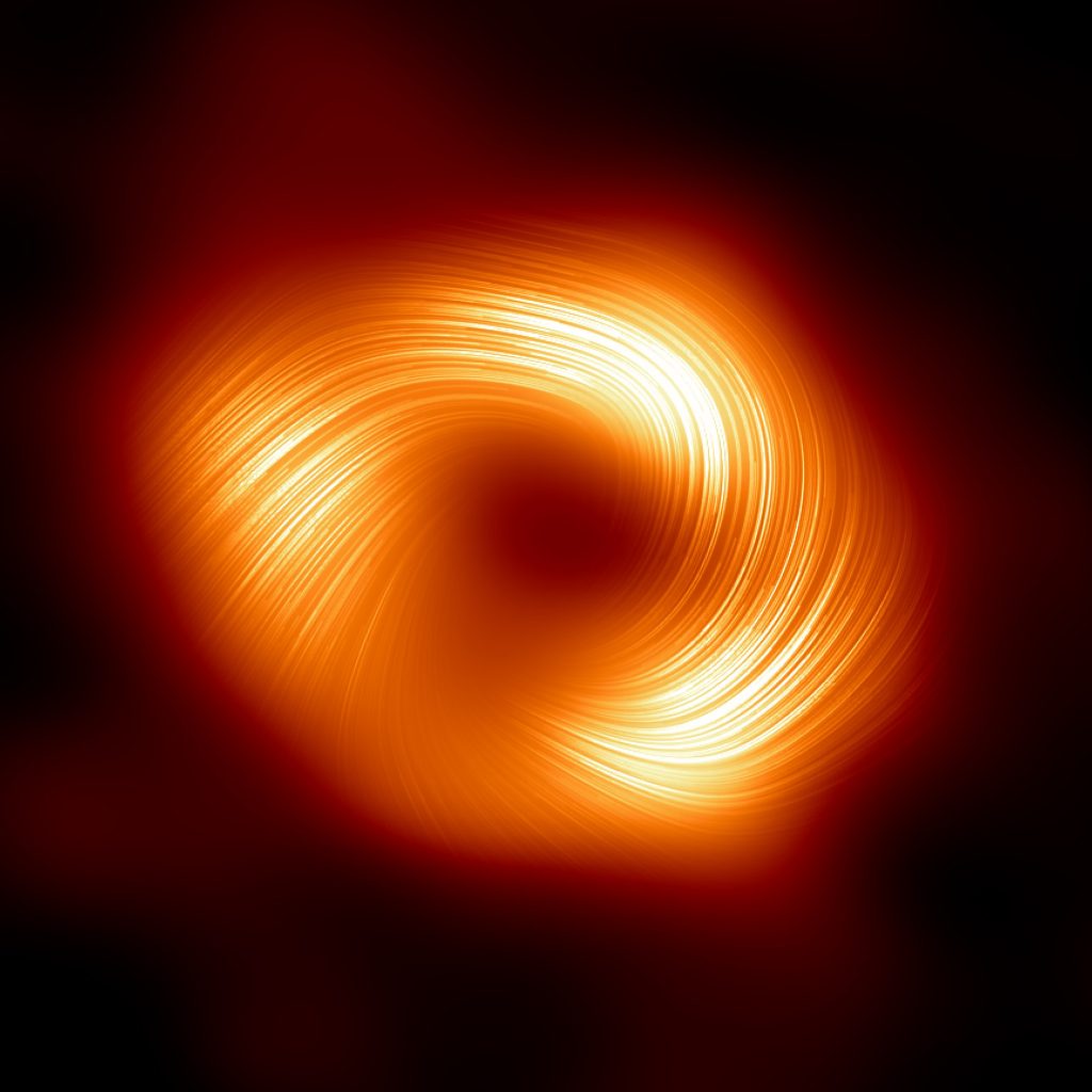 The Event Horizon Telescope (EHT) collaboration, who produced the first ever image of our Milky Way black hole released in 2022, has captured a new view of the massive object at the centre of our Galaxy: how it looks in polarised light. This is the first time astronomers have been able to measure polarisation, a signature of magnetic fields, this close to the edge of Sagittarius A*. This image shows the polarised view of the Milky Way black hole. The lines overlaid on this image mark the orientation of pola