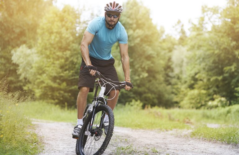 Amateur cyclist on his bike in the forest